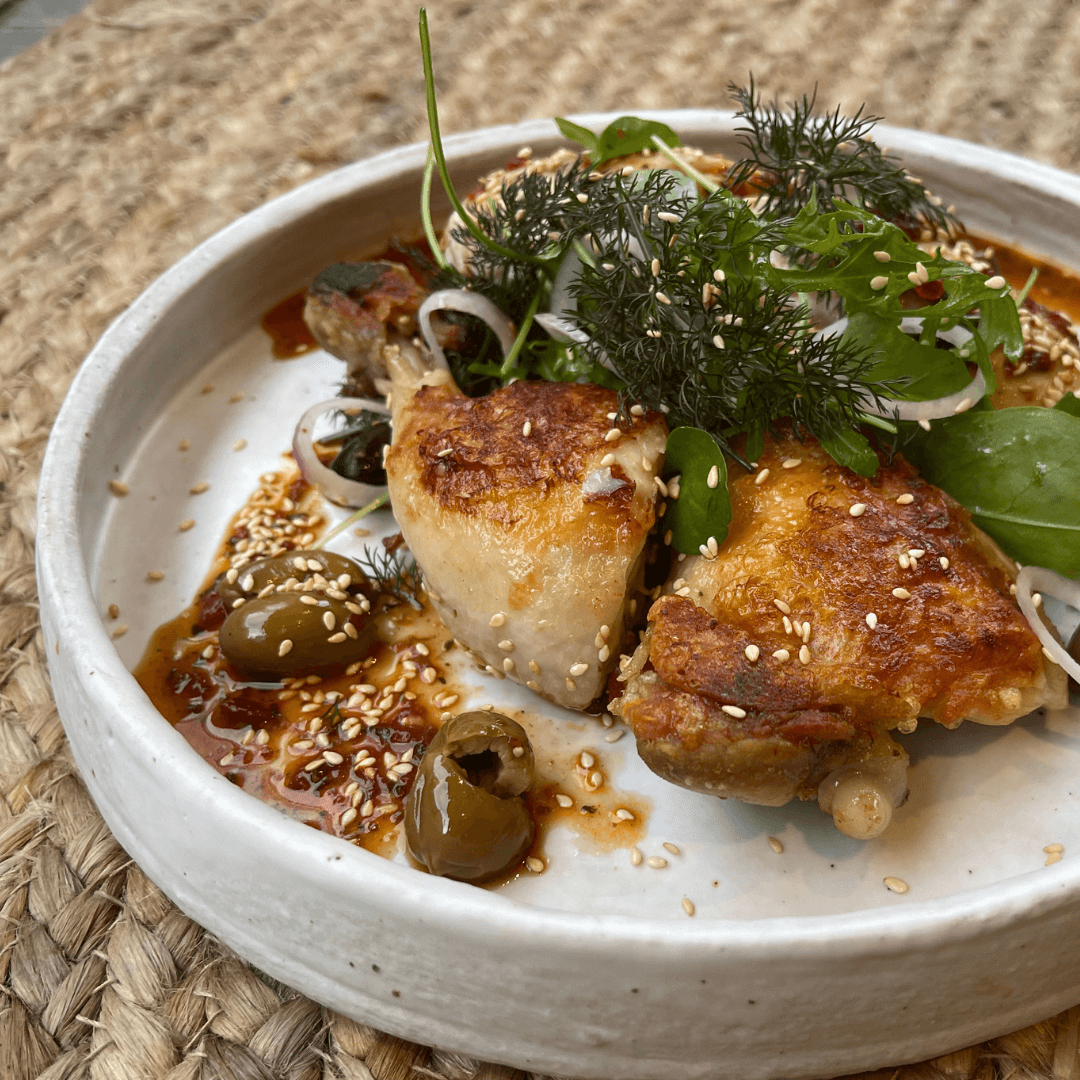 Poached Harissa Chicken Breast,Crispy Leg,Black Olive,Dill and Sesame seeds